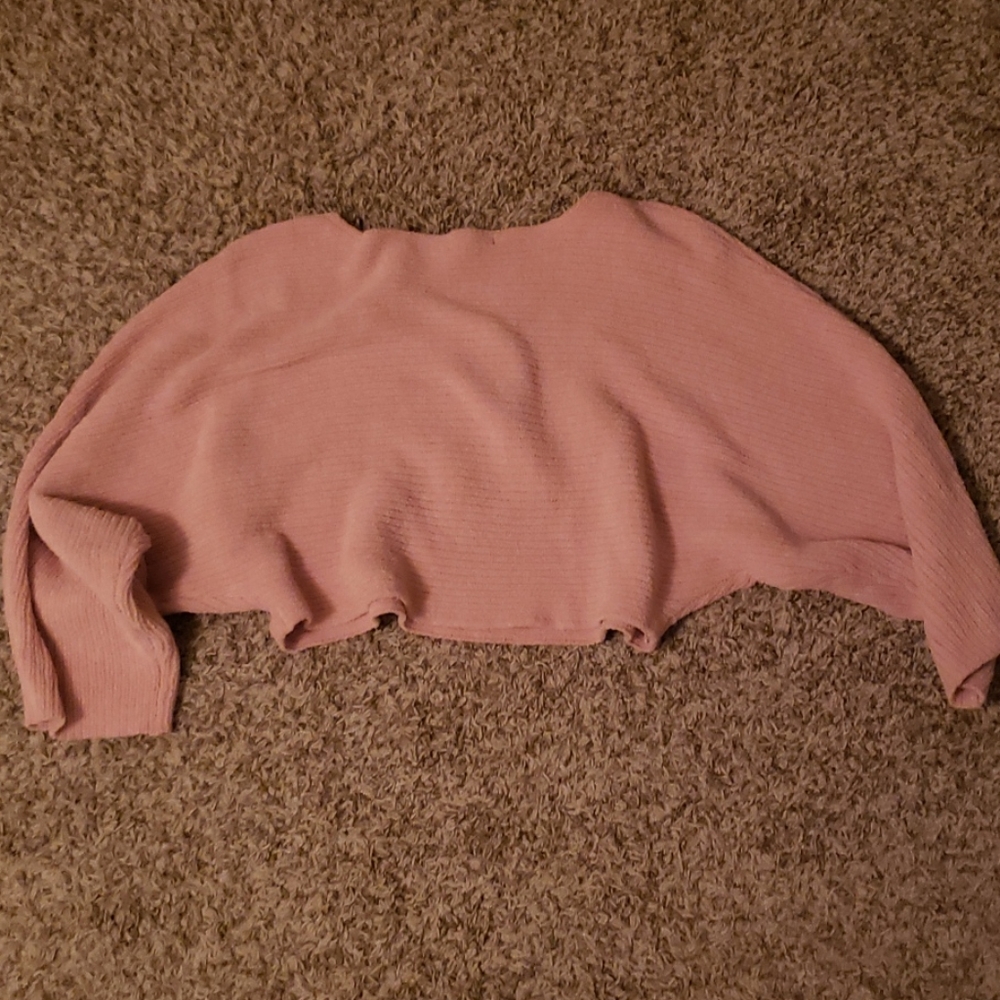Pink cropped sweater.